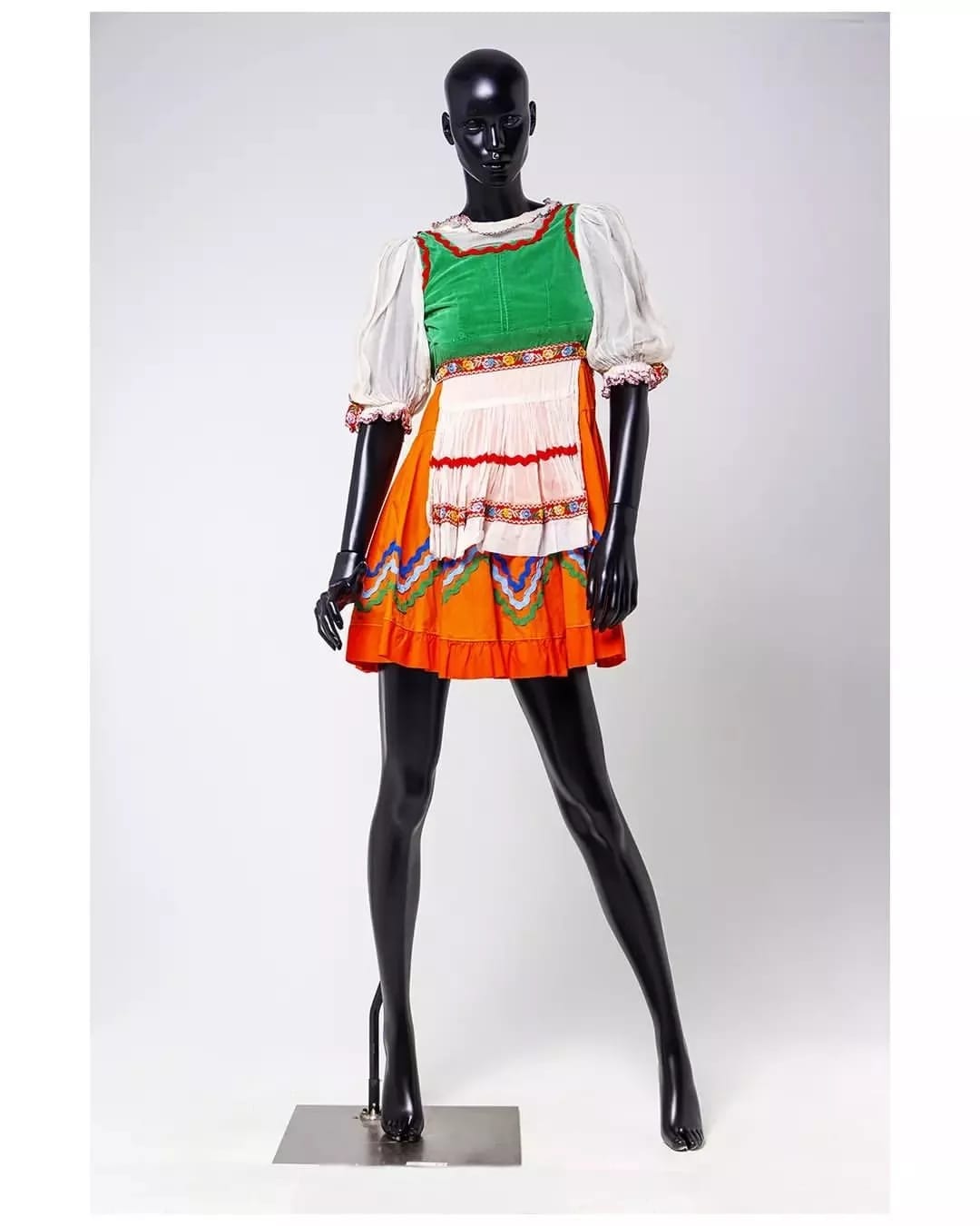 Ande Mafenuka styling — Mannequin Installation, green velvet and orange folk dress for The Market Theatre Foundation