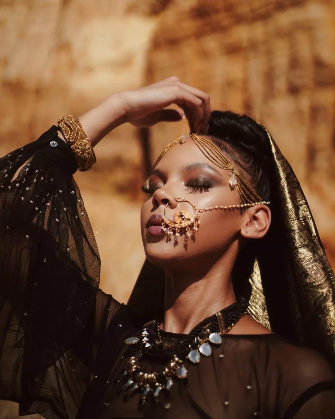 Ande Mafenuka styling — gold headpiece and sheer black, Sweet Pull Up music video